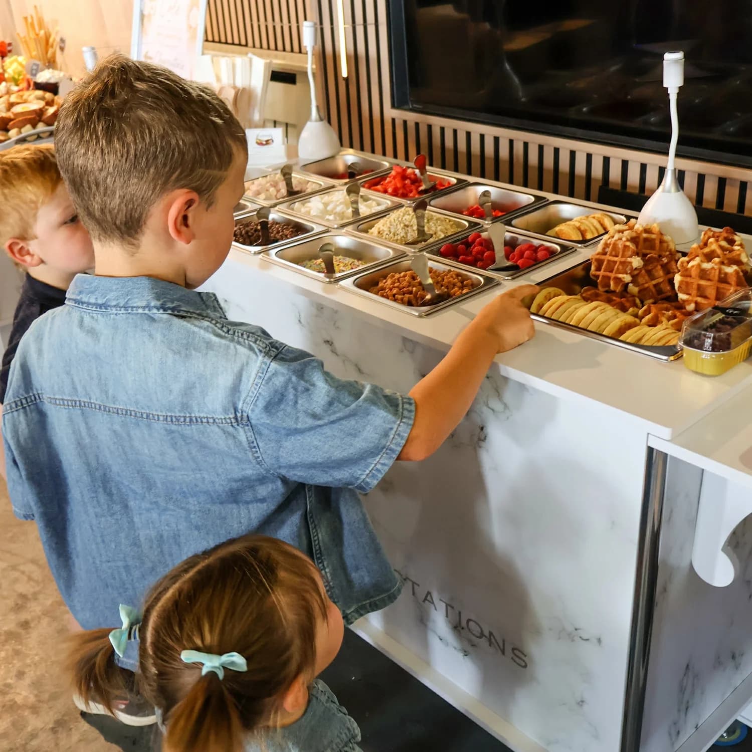 Dessert station with brownies and macarons
